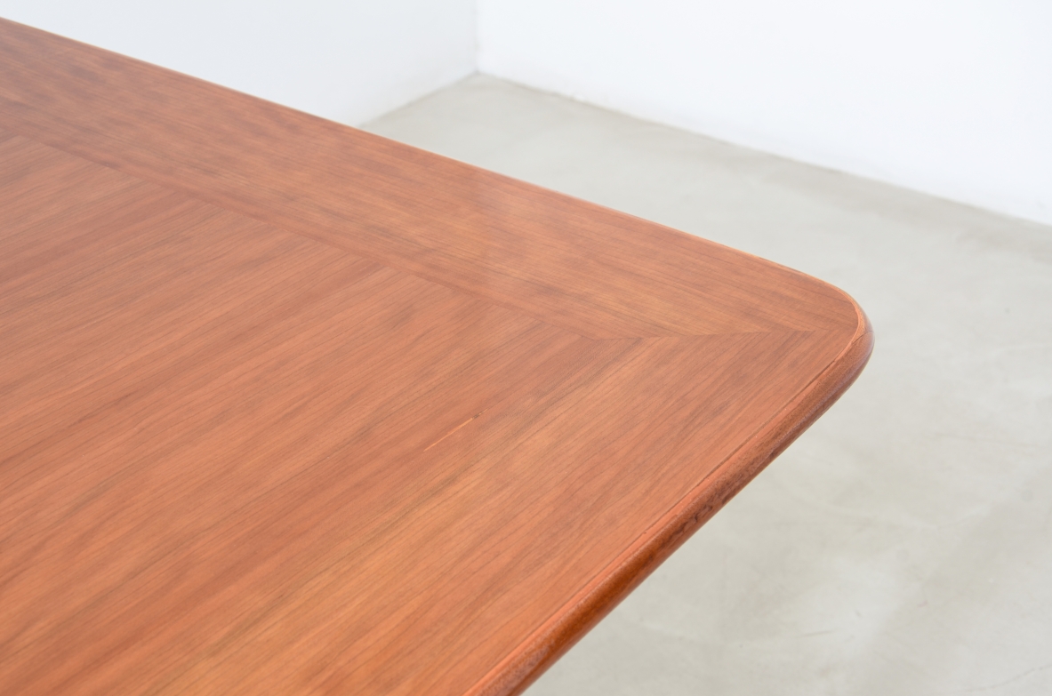 Unique cherry table with a sculptural base featuring taut lines, Made in Italy, circa 1950.