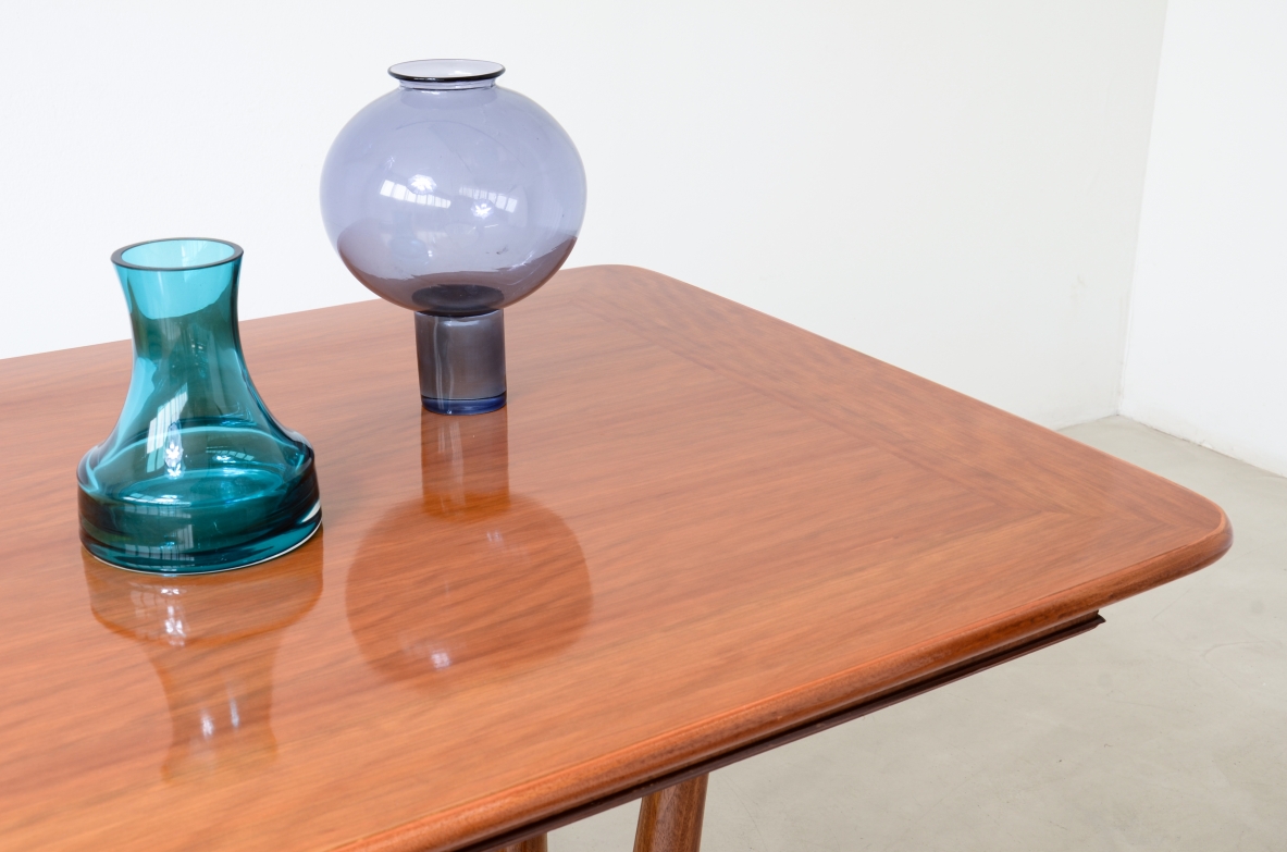 Unique cherry table with a sculptural base featuring taut lines, Made in Italy, circa 1950.