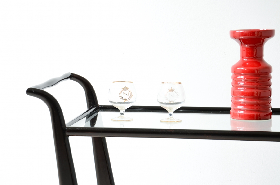 Stained wood serving trolley with two cut glass shelves.  Italian manufacture, ca. 1950.