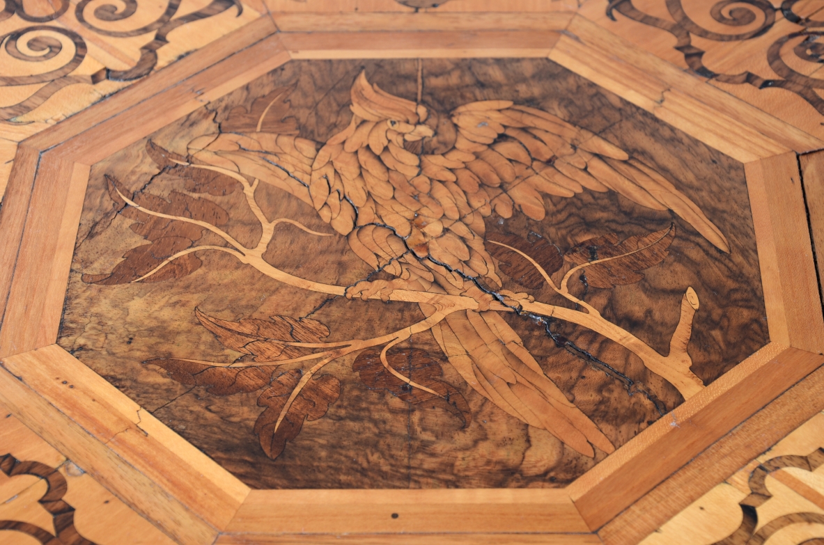Elegant polychrome wood coffee table with inlays. Charles X period, ca. 1830.