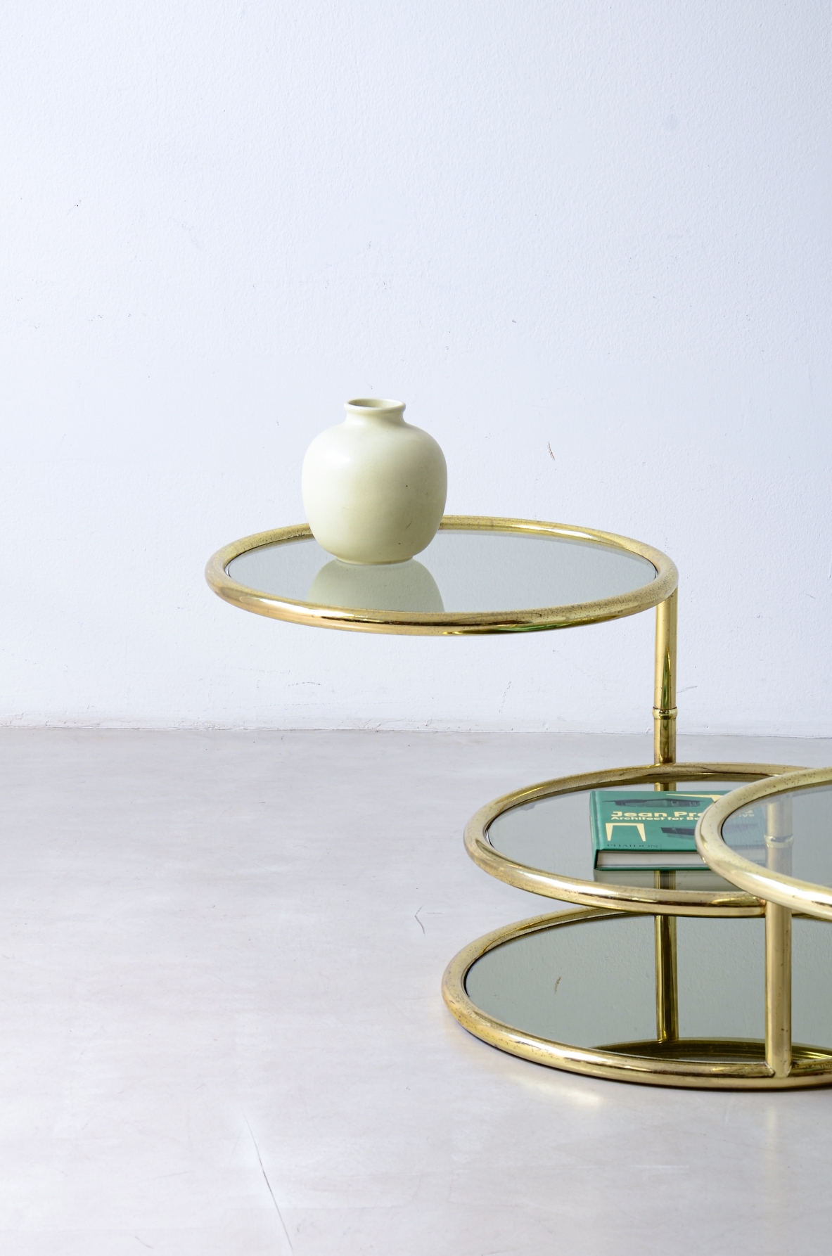 Milo Ray Baughman Brass coffee table with four circular tops in lightly blued glass 1970's