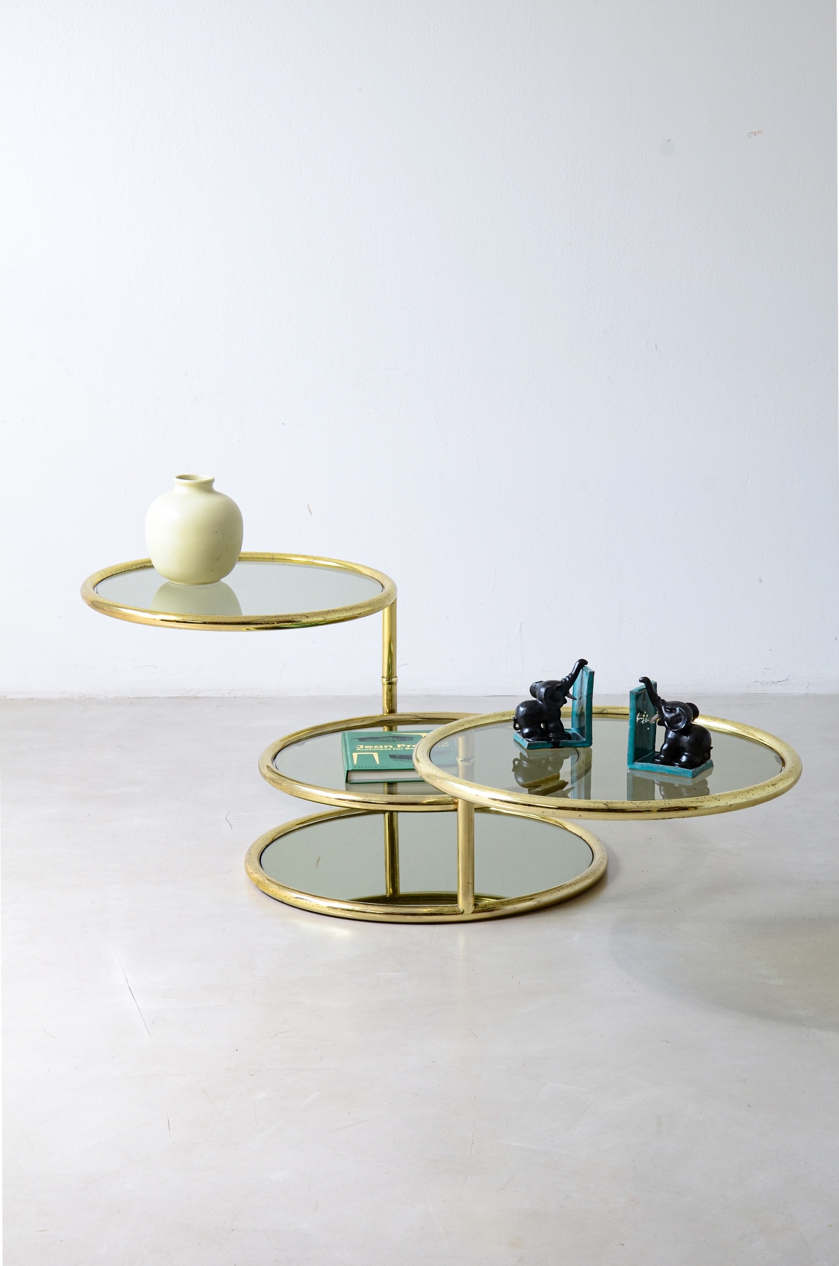 Milo Ray Baughman Brass coffee table with four circular tops in lightly blued glass 1970's