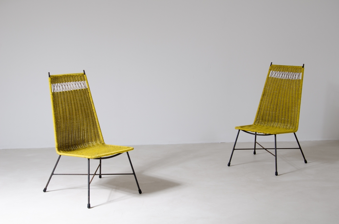 Pair of armchairs with an iron frame and woven rubber and rattan thread.Saporiti Italia, ca. 1950.