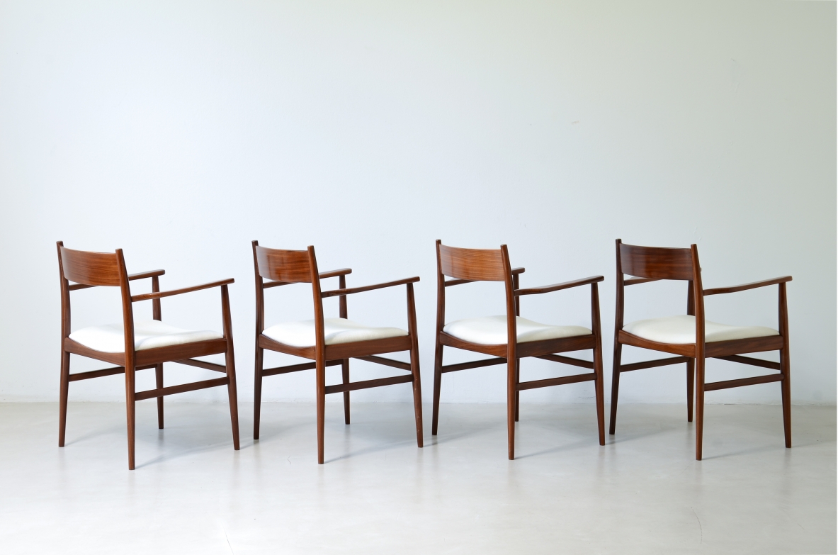 Rare set of 8 armchairs in shaped teak. Manufacture L. Jacobsen, ca. 1960.