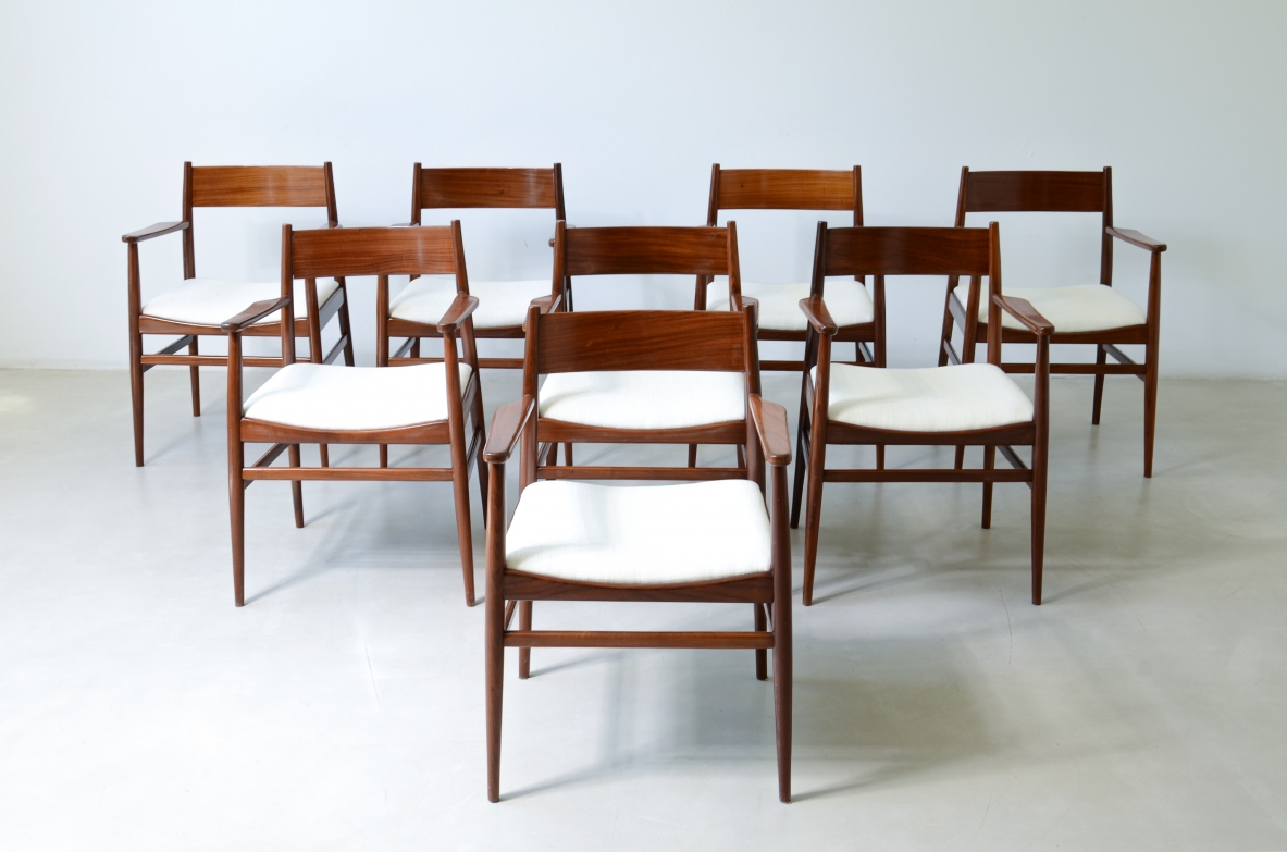 Rare set of 8 armchairs in shaped teak. Manufacture L. Jacobsen, ca. 1960.
