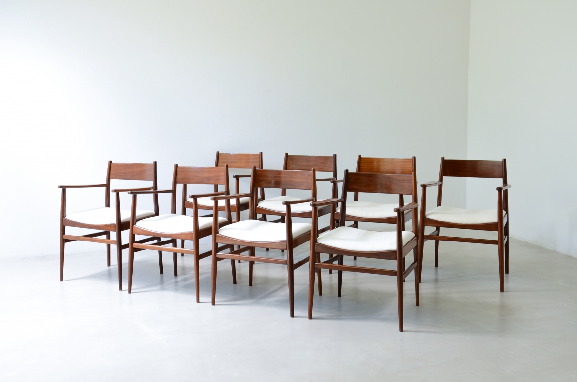Rare set of 8 armchairs in shaped teak. Manufacture L. Jacobsen, ca. 1960.