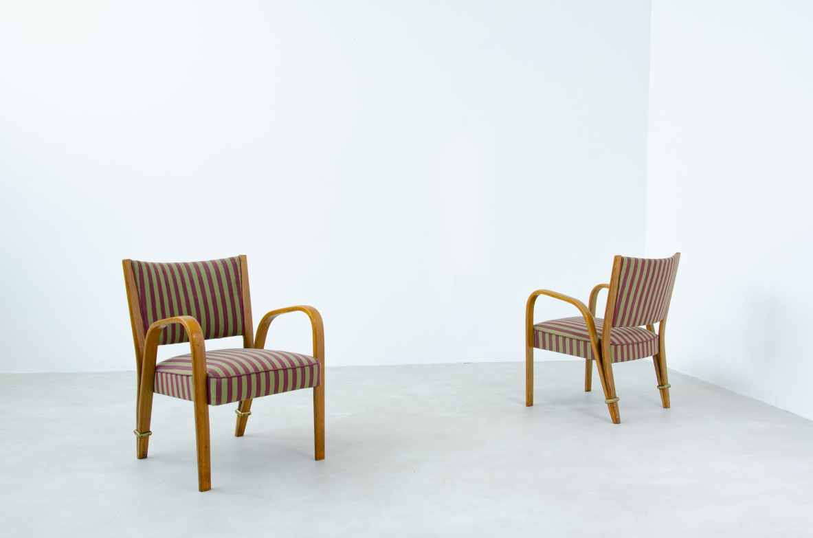 Hugues Steiner, coppia di poltrone in rovere curvato, Prod.Steiner, Francia anni 40.