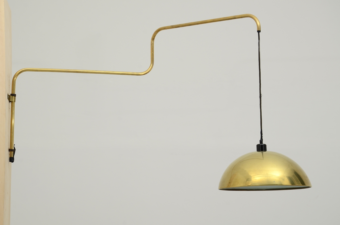 Martinelli Luce, adjustable wall lamp in brass. Italy, 1960's.