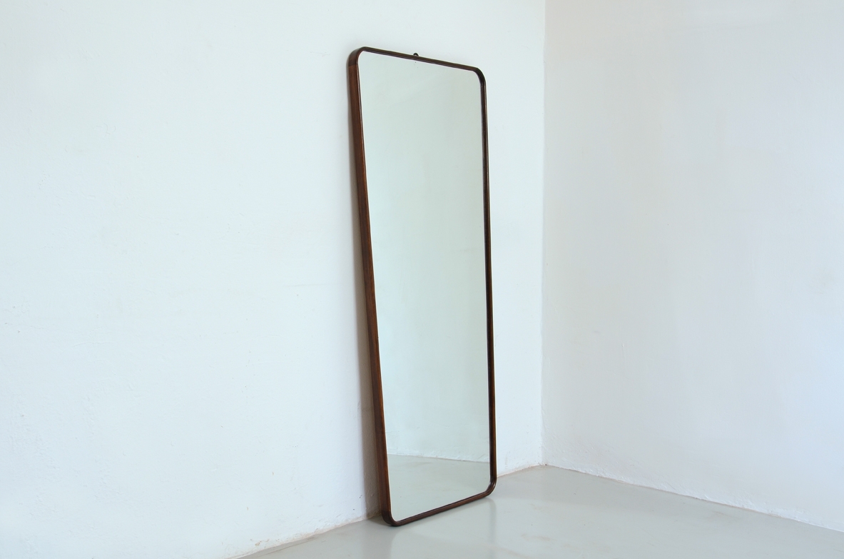 Italian 1950's mirror with a nice walnut frame.