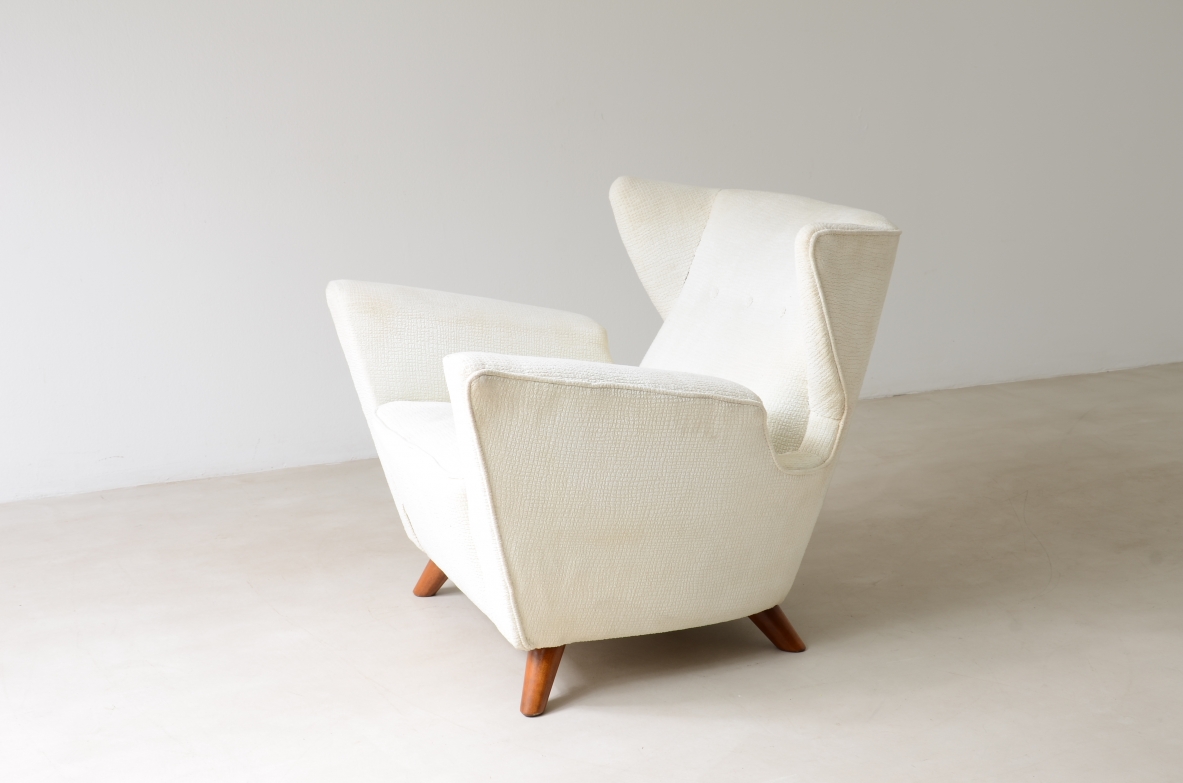 Umberto Nordio e Romano Boico (1891-1971) (1910-1985)  Rara poltrona modernista in legno imbottito e rivestito in tessuto.      Disegnata per la prima classe della nave da crociera Augustus.